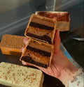 Tiramisu Patisserie Bar made by GoldBites on a background with other patisserie bars